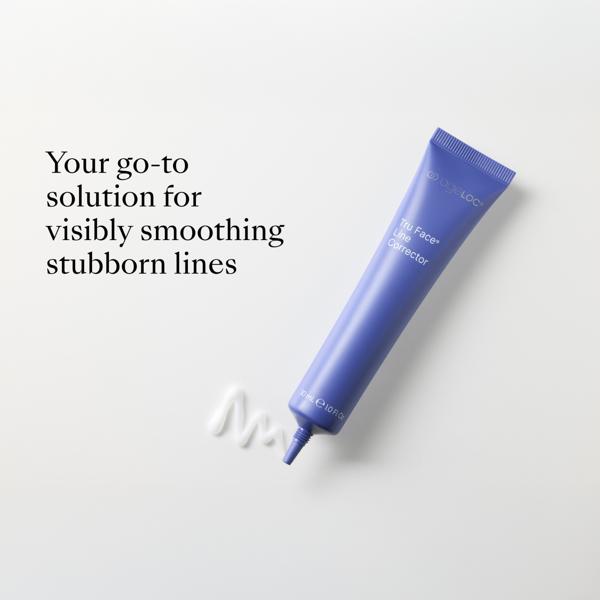 Blue skincare tube on a white background with text about smoothing lines.