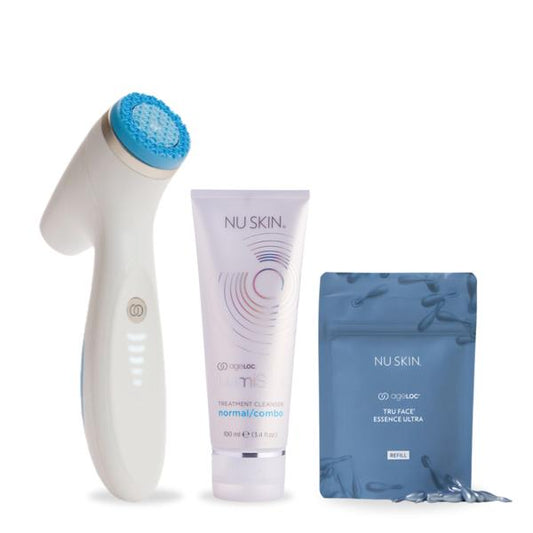 Nu Skin skincare product set with device, cream, and packets on a white background