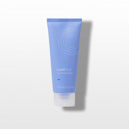 Blue tube of LumiSpa Dry cleanser on a white background