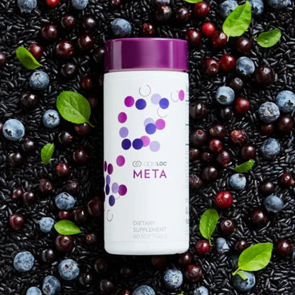 Supplement bottle with purple cap and label surrounded by black rice, blueberries, and cranberries.