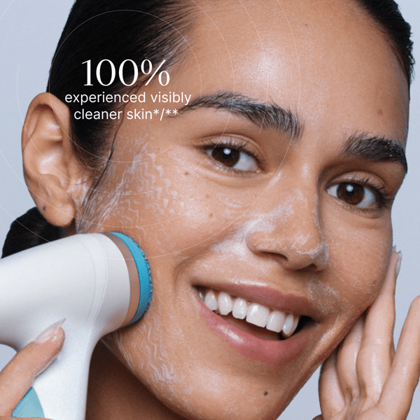 Woman using a skincare device on her face with text about skin cleanliness.