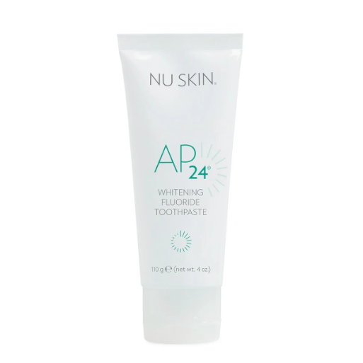 Nu Skin AP 24 Whitening Fluoride Toothpaste in a white tube with green and black text, highlighting the product's whitening features.