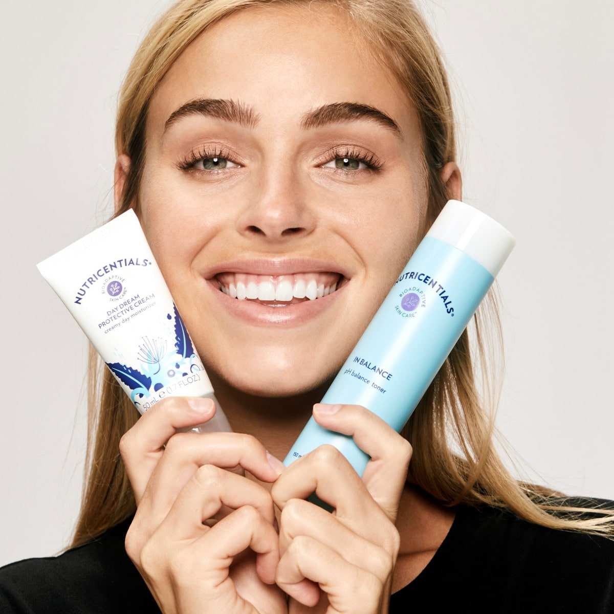 Nu Skin Nutricentials In Balance PH Toner and Day Dream Protective Cream Model Shot 