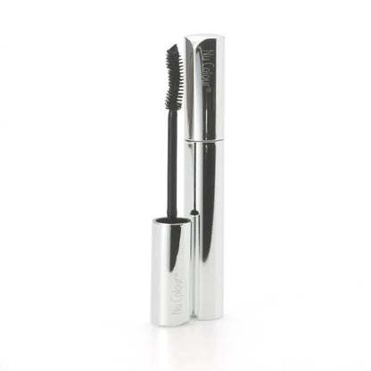 Mascara with silver casing and black brush on a white background