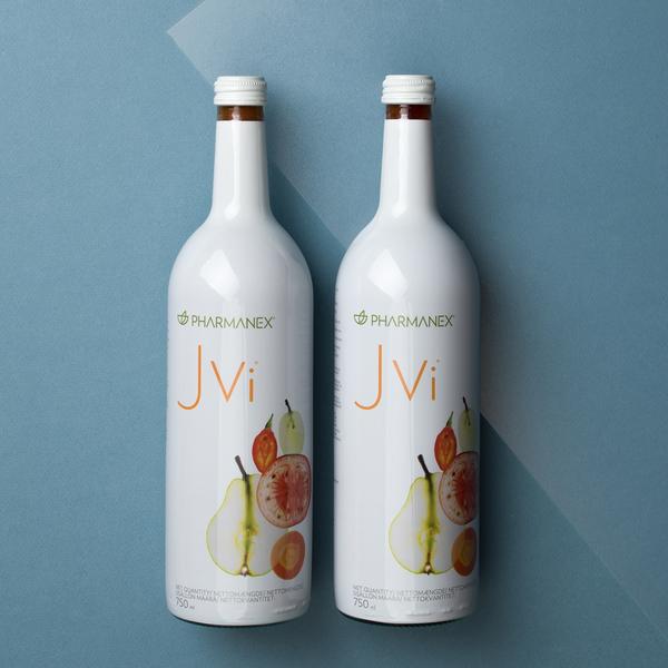 Two white bottles of JVi with a blue background
